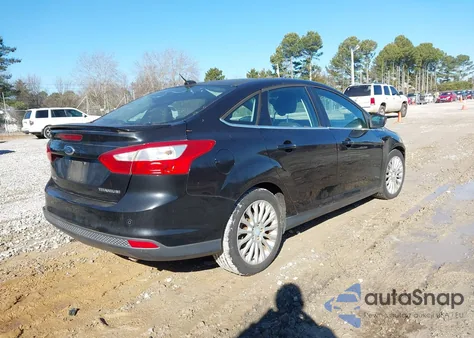 2012 Ford Focus Titanium z USA, uszkodzony, nr VIN 1FAHP3J24CL173710